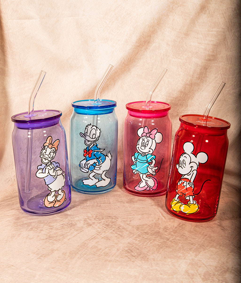 Set of four Disney glass tumblers with retro Mickey and Friends sketch designs.