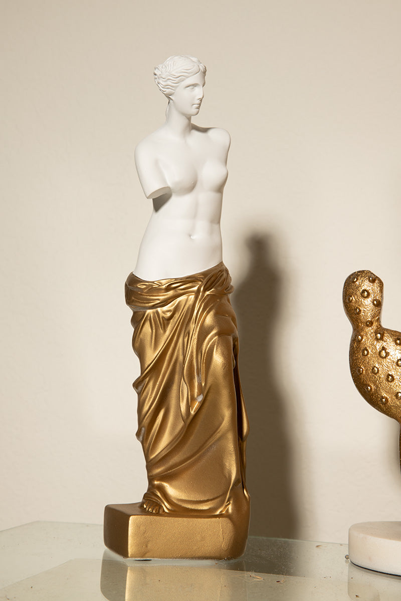 Gold and white Venus statue Greek goddess sculpture for elegant home decor and interior styling.