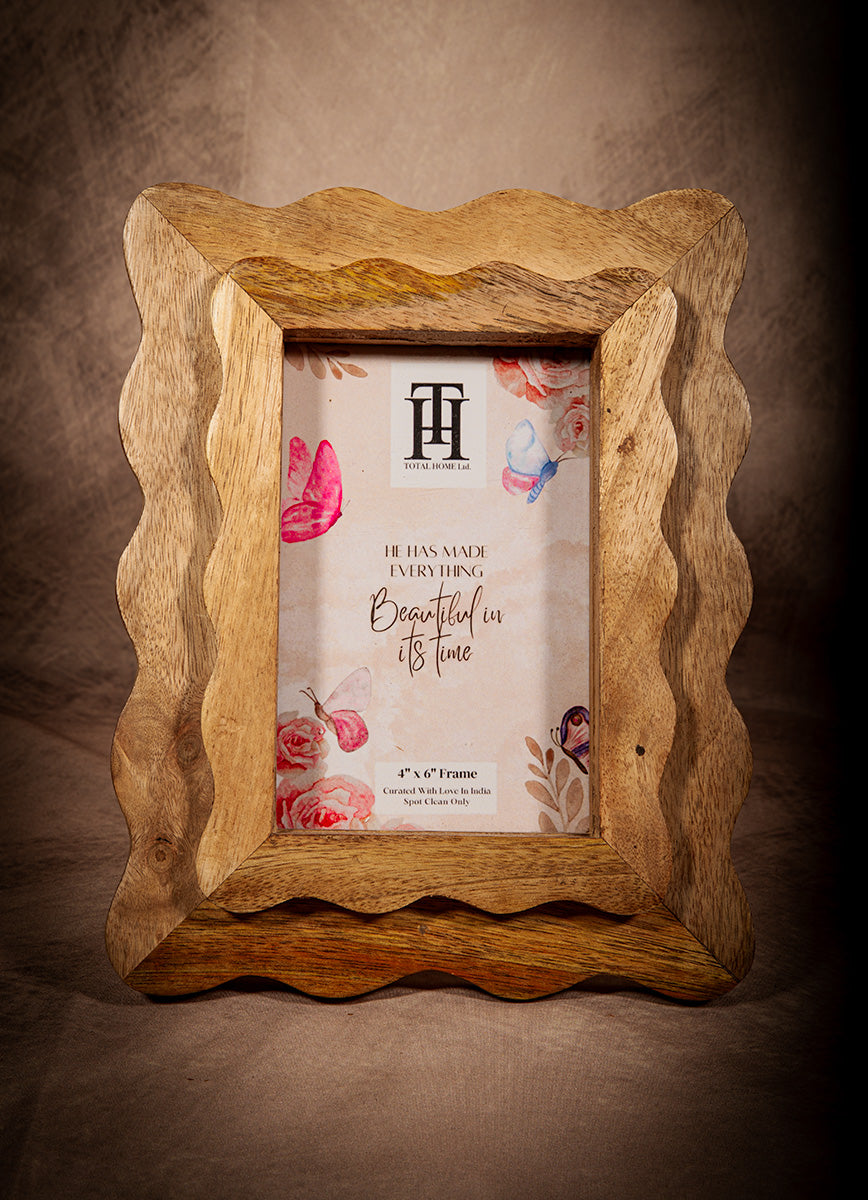 Natural wood scalloped picture frame with rustic handcrafted design for farmhouse decor.