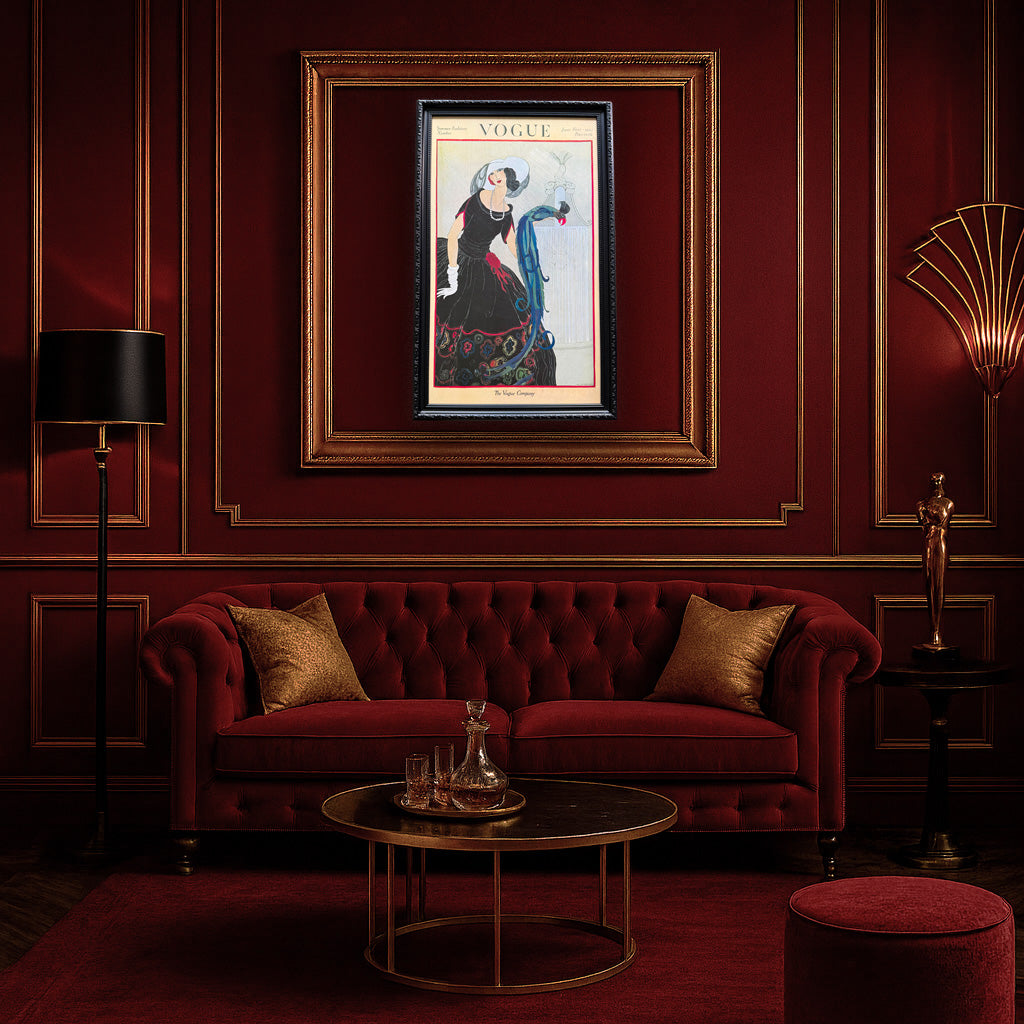 Luxurious living room with a red sofa, gold coffee table, and framed Vogue poster on a red wall.