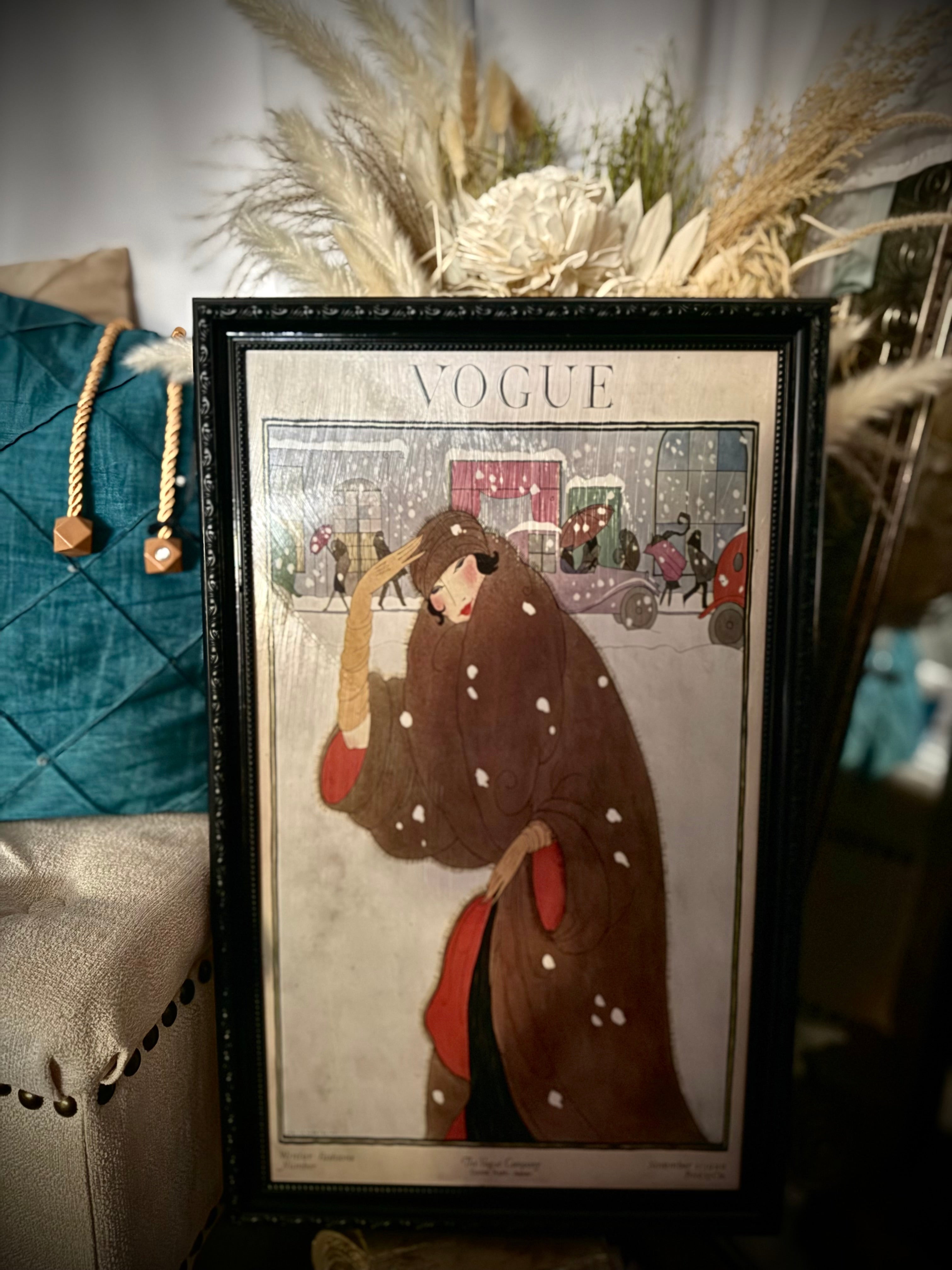 Vogue Winter Fashions 1920 Lepape cover art in black ornate frame with snowy city scene and elegant woman in brown coat.