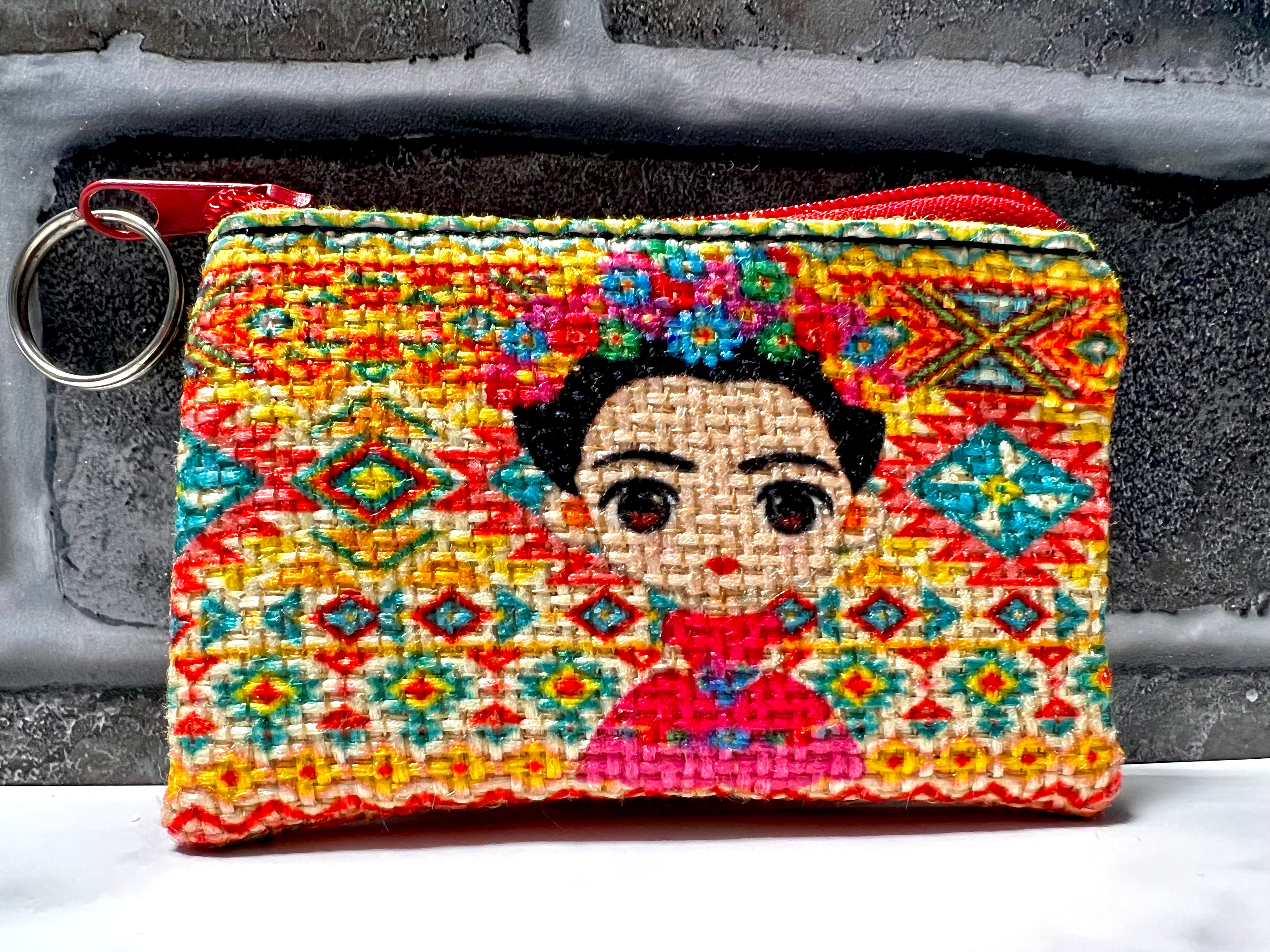 Colorful handwoven coin purse with Frida Kahlo portrait and geometric embroidery, artisan-made in Mexico