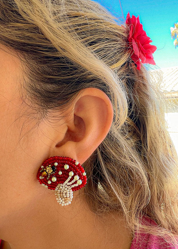 handmade red mushroom beaded earrings with tiny bug accent whimsical cottagecore fantasy jewelry