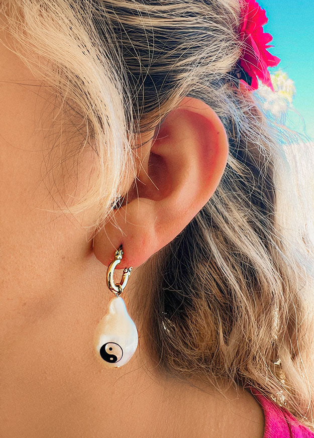 yin and yang pearl drop earrings black and white enamel design symbolic balance jewelry