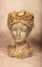 golden goddess bust statue adorned with seashell and coral crown on beige background, coastal mythology decor sculpture