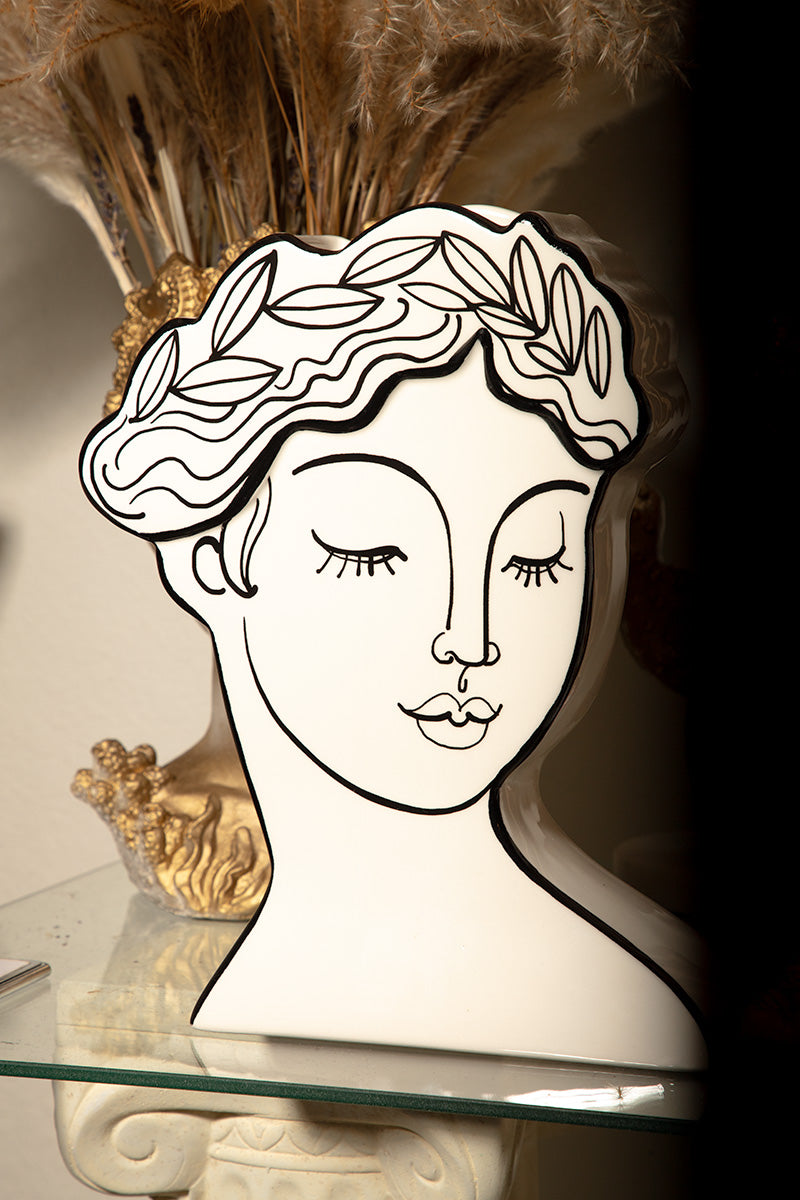 Greek goddess line art ceramic bust planter with modern minimalist design, perfect for home or studio decor.
