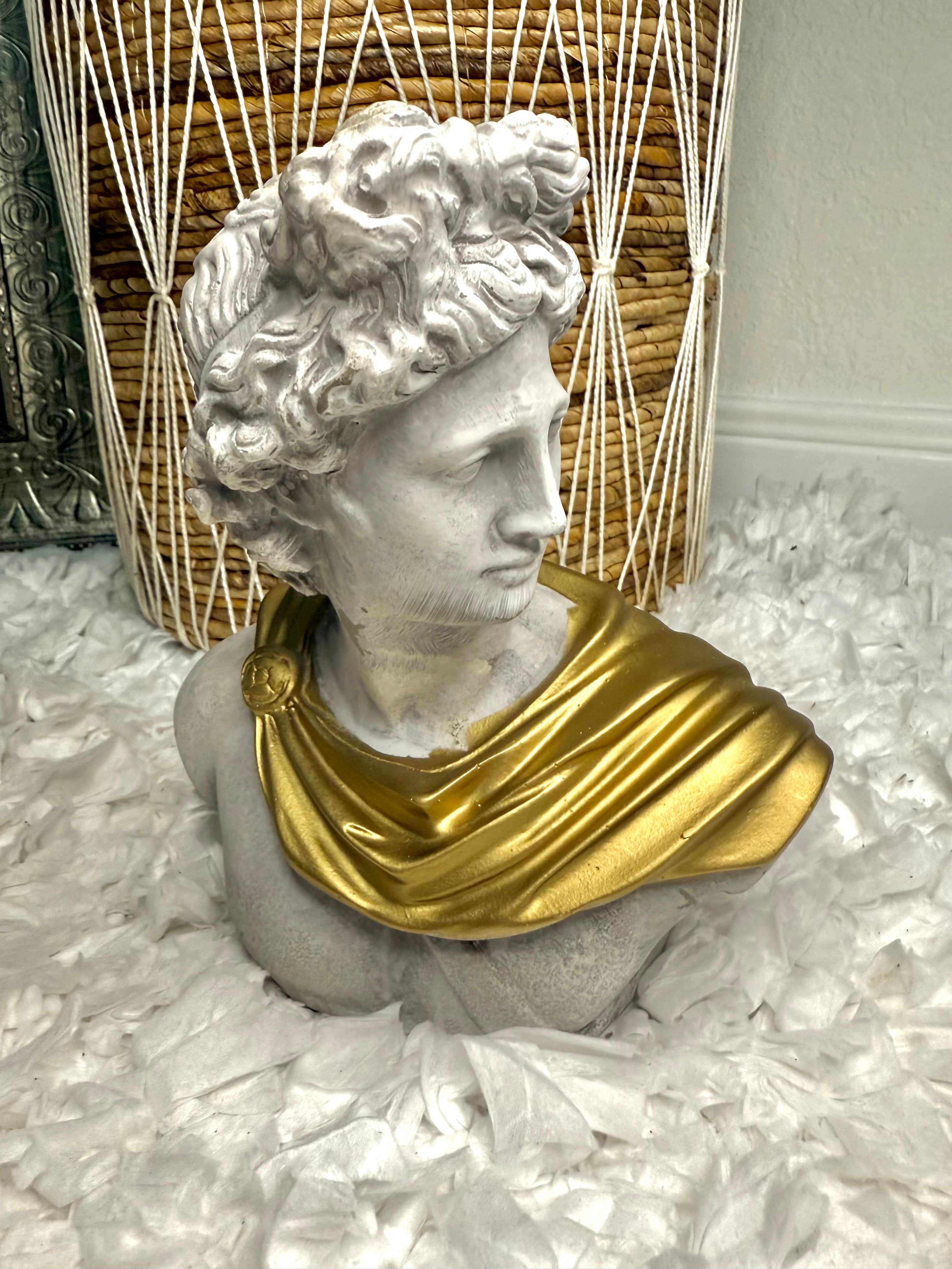 Stone and gold Apollo bust sculpture inspired by Greek mythology, elegant neoclassical home decor.