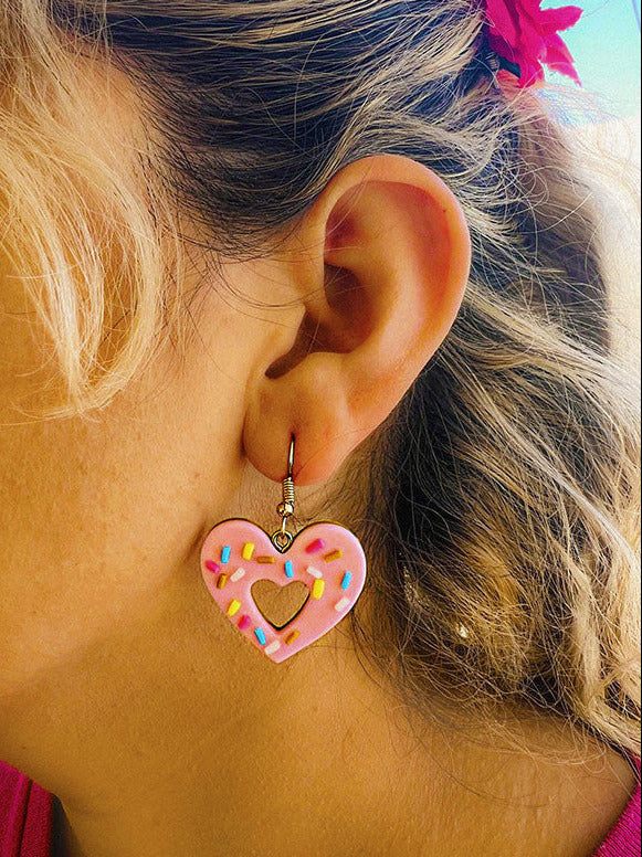 pink acrylic heart donut earrings with frosting detail cute cosplay and kawaii inspired jewelry