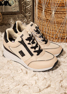 Tan and black DKNY Kai wedge platform sneakers women’s retro athletic fashion casual footwear
