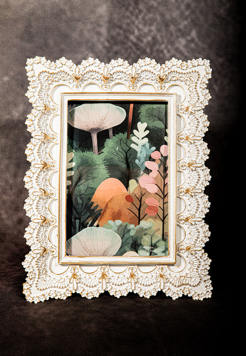 White lace picture frame with gold accents, romantic floral design for vintage wall or tabletop decor.
