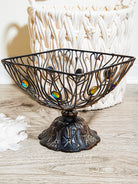 Vintage bronze wire fruit basket with rhinestone trim, antique metal stand for kitchen or table decor.
