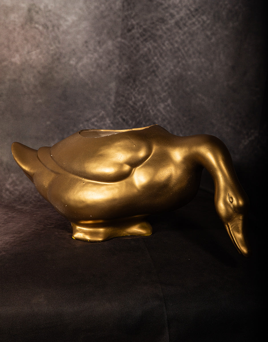 Vintage gold ceramic goose planter for shelf or floral display, Hollywood Regency style.