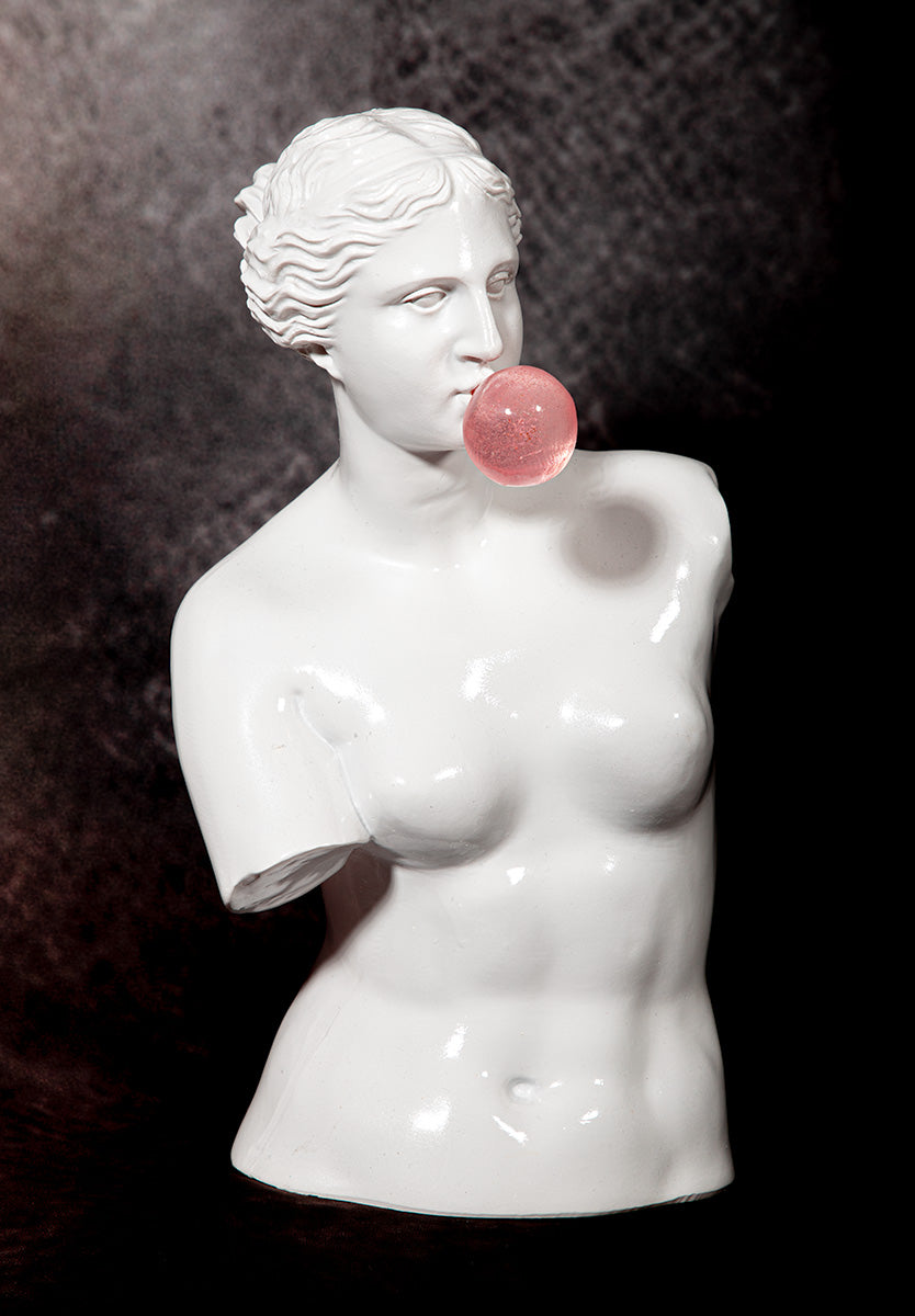 Modern Greek Venus bust sculpture with bubblegum, fun statement piece for art or home decor.
