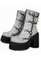 Grey reflective women’s platform boots with chain details futuristic cyber rave festival footwear
