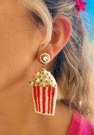 retro popcorn bag earrings hand beaded in red and white with gold detail fun movie inspired jewelry