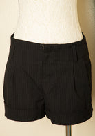 Vintage black and white pinstripe shorts size medium with cuffed hem and tailored fit ideal for vintage summer wardrobe